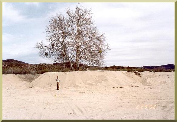Closeup of sand-mining pit at Arroyo El Barbon, near Ojos Negros, Baja California, Mexico.