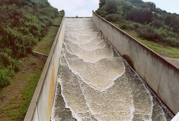 Roll waves on spillway at Turner dam, near Valley Center, <br>San Diego County, California, spilling on February 24, 2005