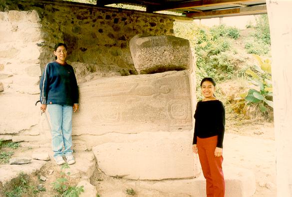 Julieta and Flor in front of petroglyph at Huamelulpam.