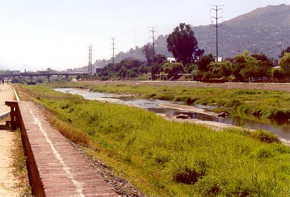 View of the Atoyac river looking downstream to the bridge at project end