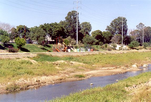 View of the right bank of Rio Atoyac, showing gabions and recreational fixtures