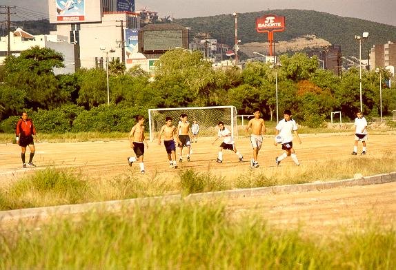 Soccer playing in the flood channel of Rio Santa Catarina