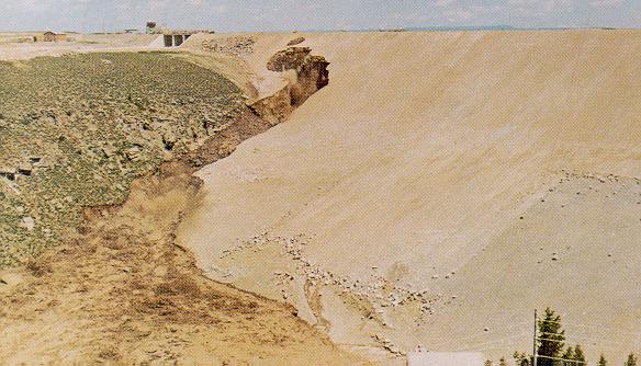 Second hole in face of dam . A few minutes after 11.30 AM. June 5, 1976.